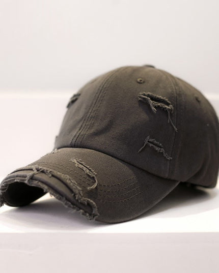 Zerrissene Cap