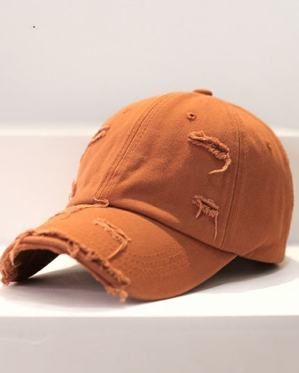 Zerrissene Cap