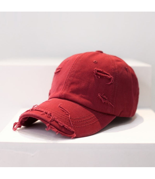 Zerrissene Cap