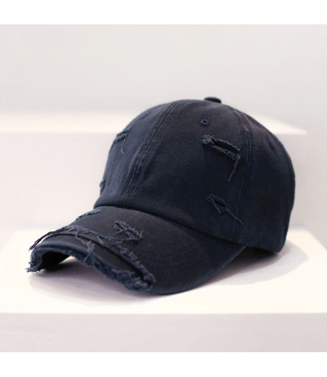 Zerrissene Cap
