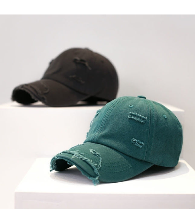Zerrissene Cap