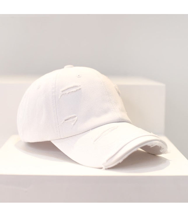 Zerrissene Cap