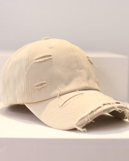 Zerrissene Cap