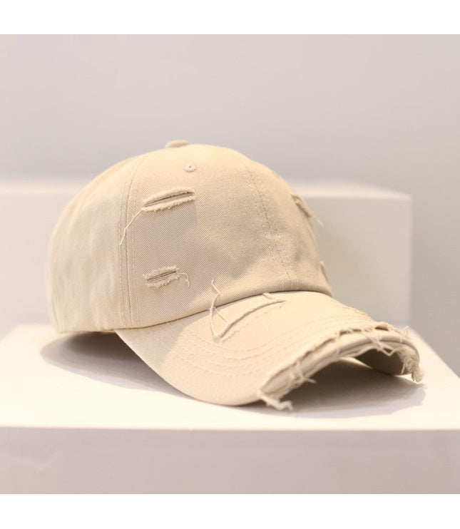 Zerrissene Cap
