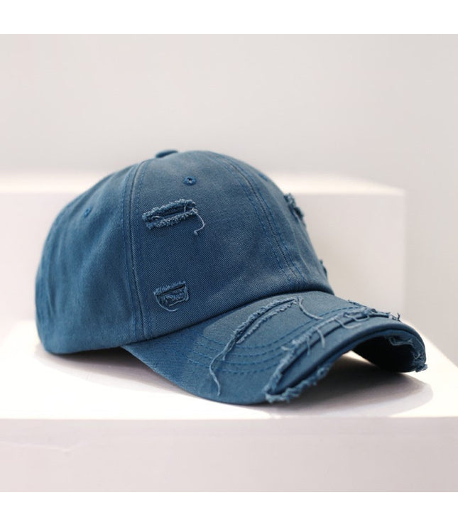 Zerrissene Cap